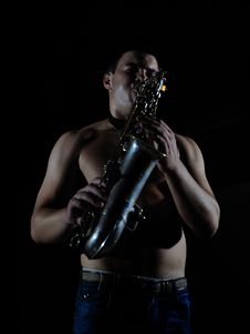 Young Handsome Man Playing Music On Saxophone Royalty Free Stock Images Young Handsome Man Playing Music On Saxophone Royalty Free Stock Images