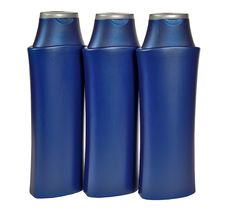 Three Dark Blue Plastic Bottles Stock Photo