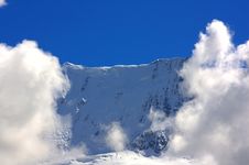 Mountain Top Flanked By Clouds Stock Image Mountain Top Flanked By Clouds Stock Image