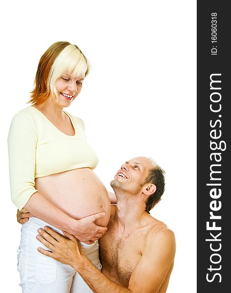 Young pregnant woman with her man on white background. Young pregnant woman with her man on white background