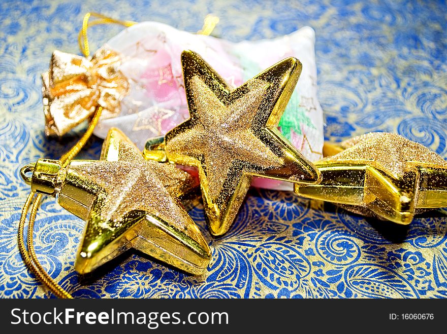 Christmas toys and present on the colorful background