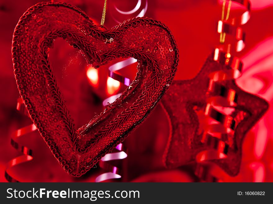 Red christmas baubles and ribbons on red background. Red christmas baubles and ribbons on red background