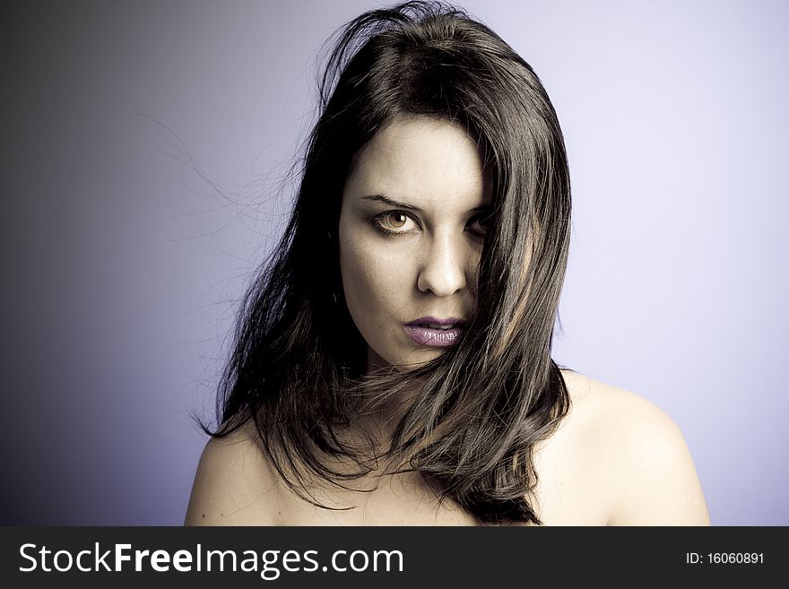 Voluptuous look of brunette young woman. intense expression