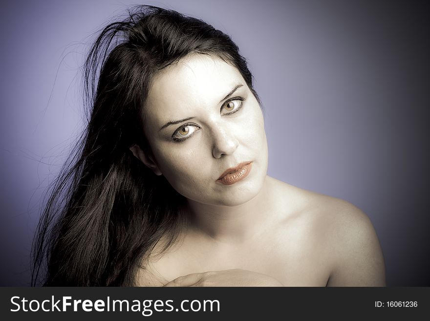 Voluptuous look of brunette young woman. intense expression