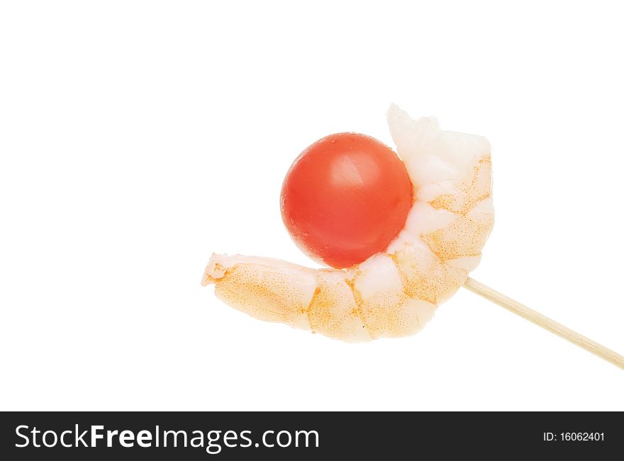 Prawn and cherry tomato on a cocktail stick. Prawn and cherry tomato on a cocktail stick