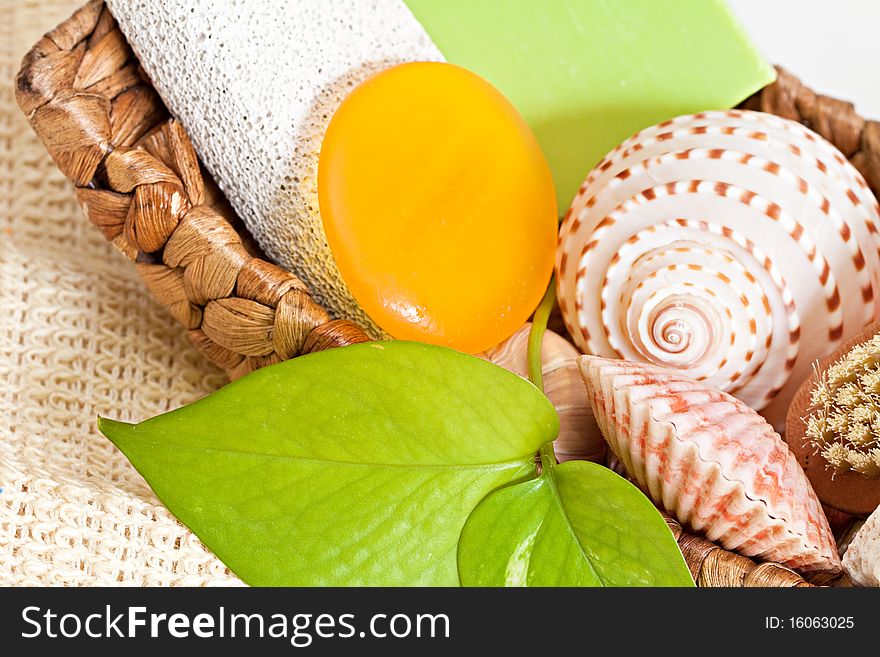 Palm basket with spa accessories isolated on white background. Palm basket with spa accessories isolated on white background.