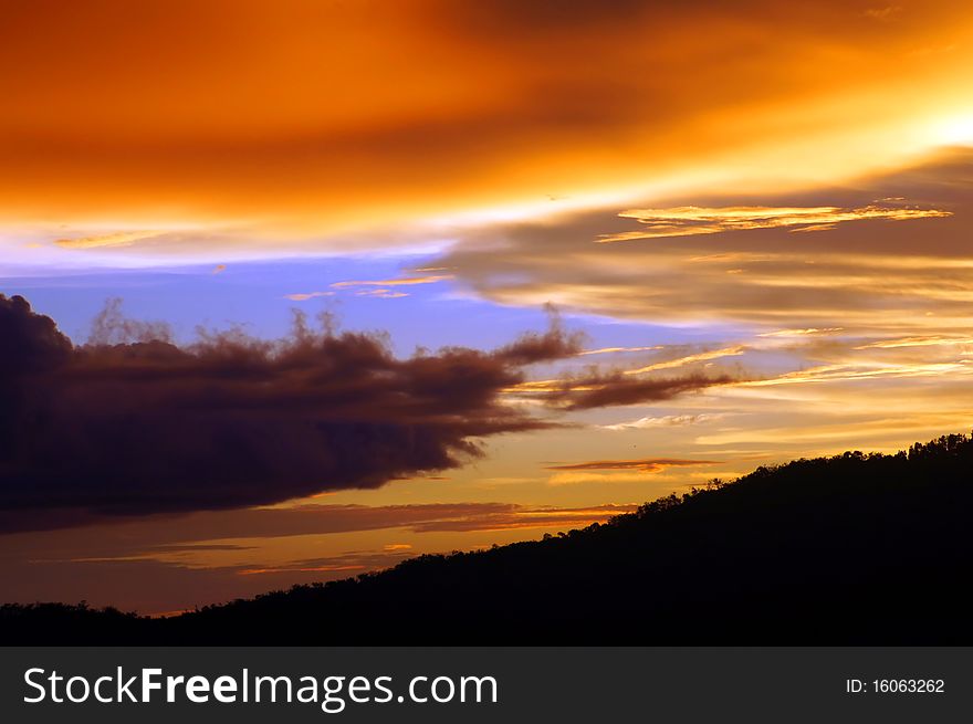Clouds and sky at sunset for backgrounds