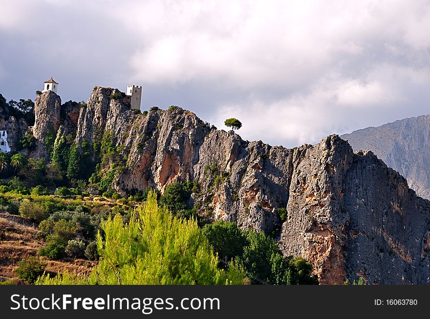 Spain Guadalest mountain sun sky ridge protrusion landscape painting Village