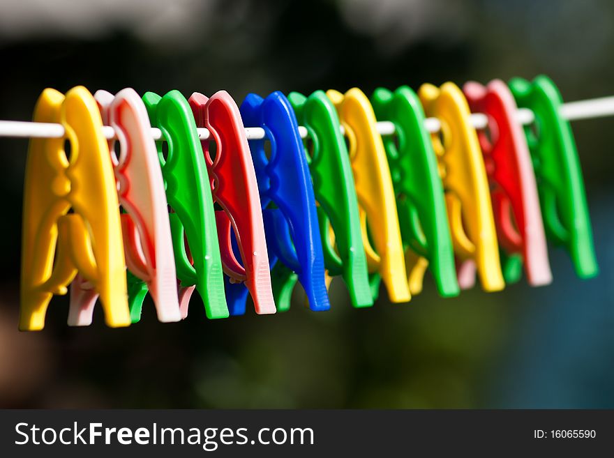 Group of colored clothes pegs