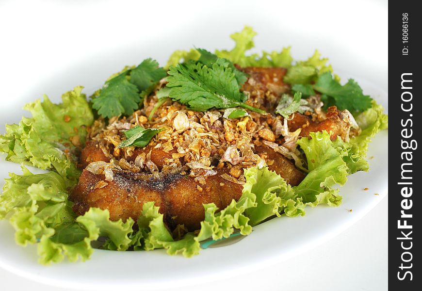 Thai food, fried fish with garlic