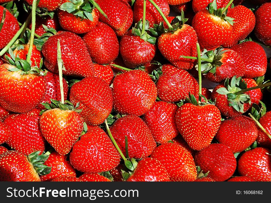 Red strawberries in a market. Red strawberries in a market