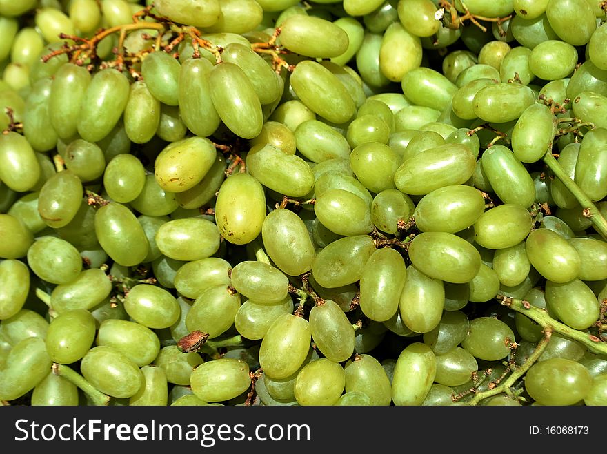 Green grape clusters in a market. Green grape clusters in a market