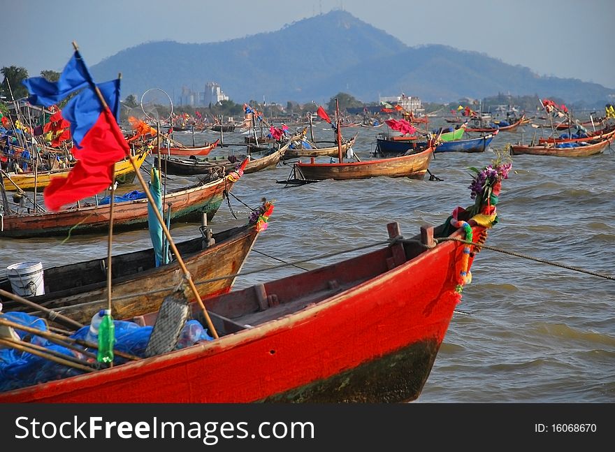 Red boat in the sea cannot go out.