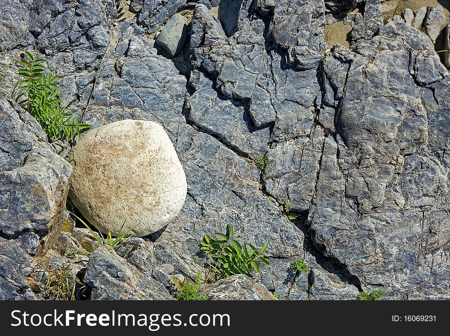 Abstract stone background with round white stone