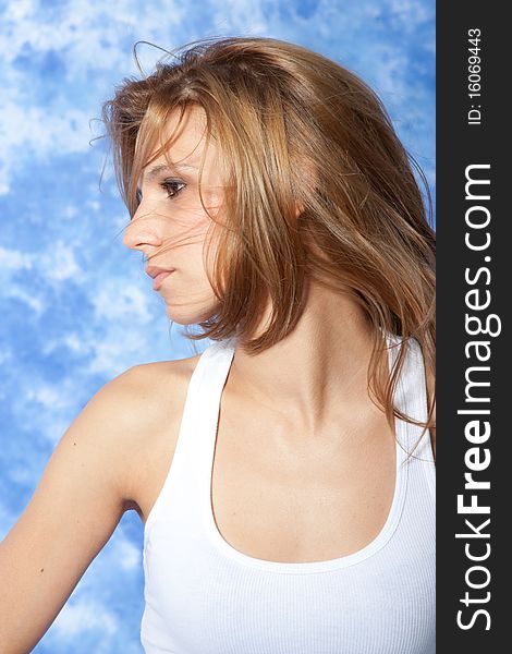 Female model posing with hair over the face. Female model posing with hair over the face