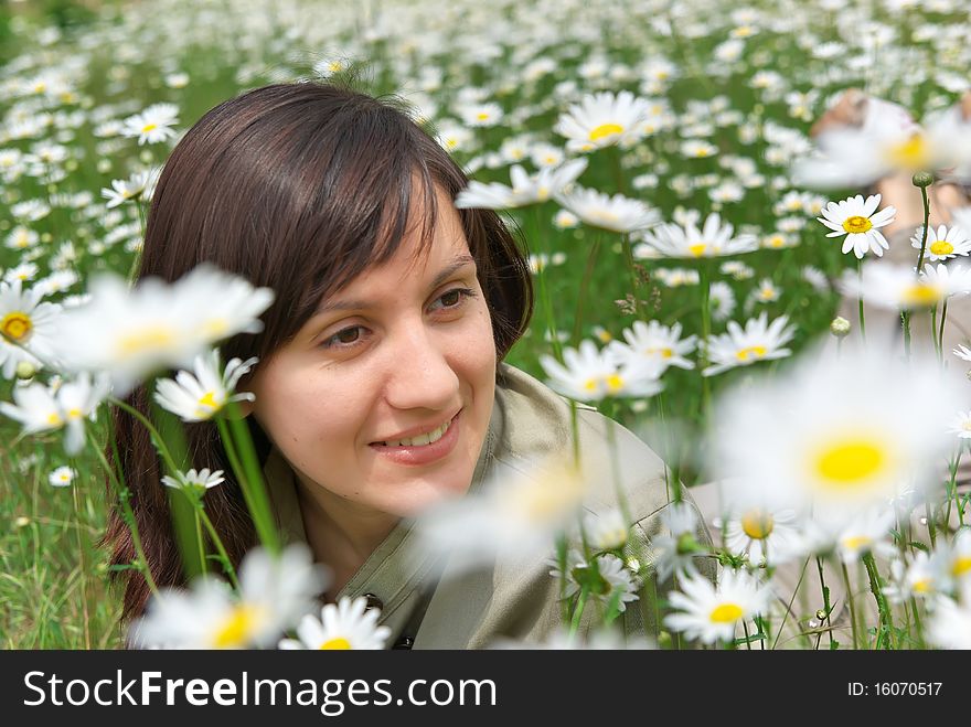 Girl in meadow. Nature composition.