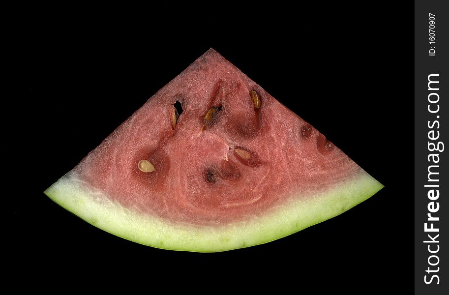 Slice of watermelon on the black background