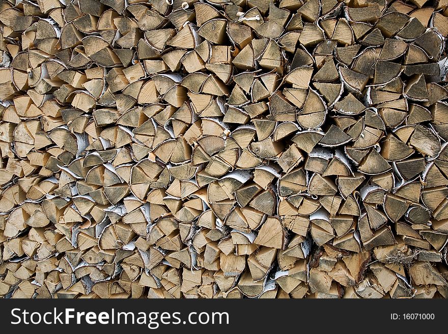 Birch firewood stacked in the woodpile