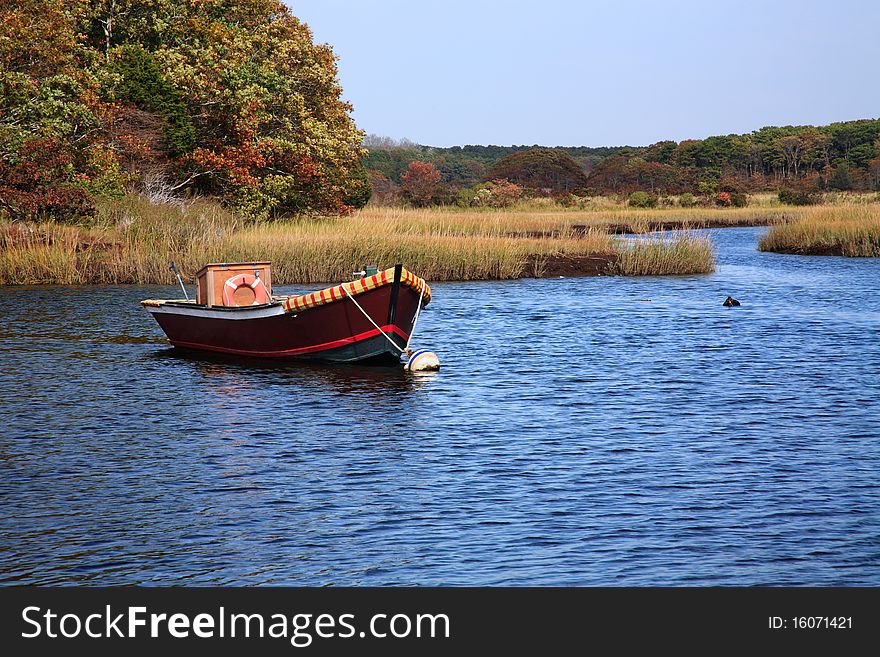 Fishing Boat At Rest In a Marshy Pond, Cape Cod, Massachusetts