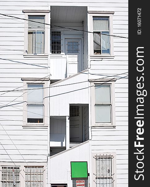 White wooden windows on a white house