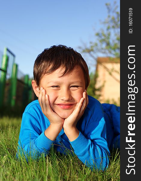 Little Boy In Grass