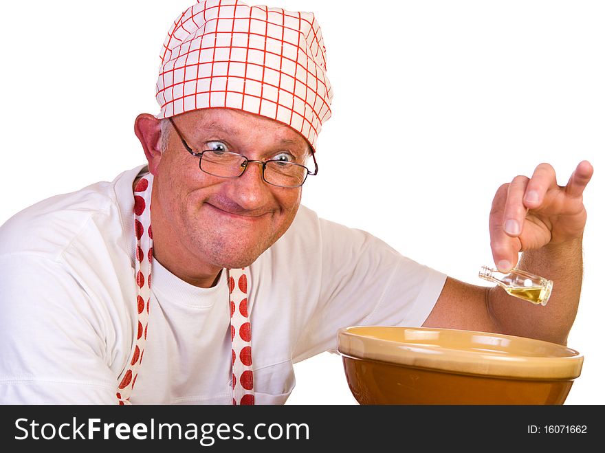 Man pouring a spice into a bowl. Man pouring a spice into a bowl