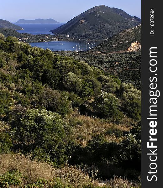 Bay at Greek island of Lefkas with sail boats at sunny day. Bay at Greek island of Lefkas with sail boats at sunny day.