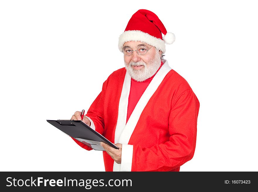 Smiley Santa Claus writing on clipboard isolated on white background