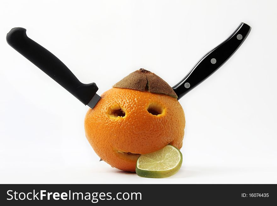 Orange face with lemons and knifes