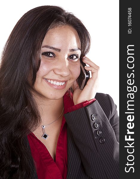 A close up shot of a happy woman on her cell phone. A close up shot of a happy woman on her cell phone.