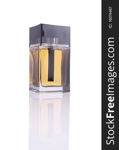 Male Cologne back lit bottle with reflection with clipping path around the bottle and reflection. Male Cologne back lit bottle with reflection with clipping path around the bottle and reflection.