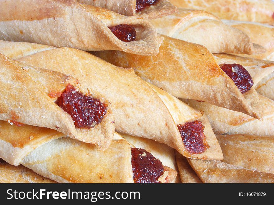 Object on white: food - Tubules with jam and sugar;