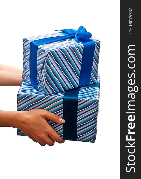 Female hands with a blue gifts boxes isolated on white background. Female hands with a blue gifts boxes isolated on white background