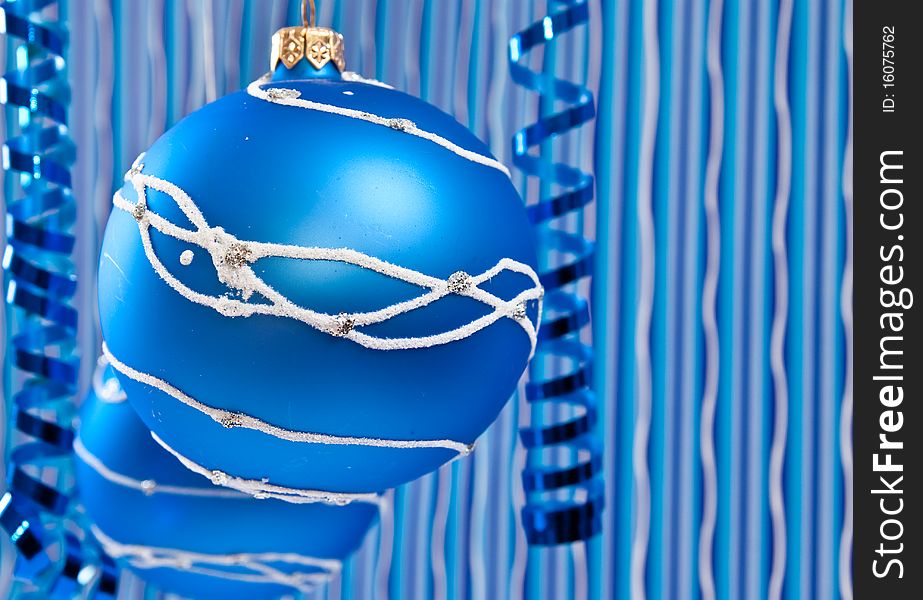 Christmas decoration from two blue balls on blue background. Christmas decoration from two blue balls on blue background