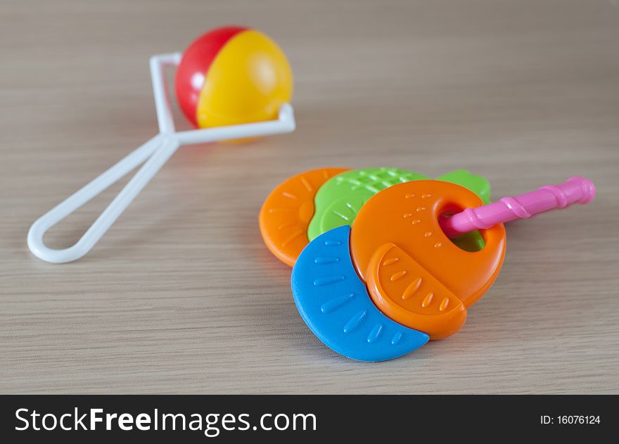 Two tiny plastic rattles for baby