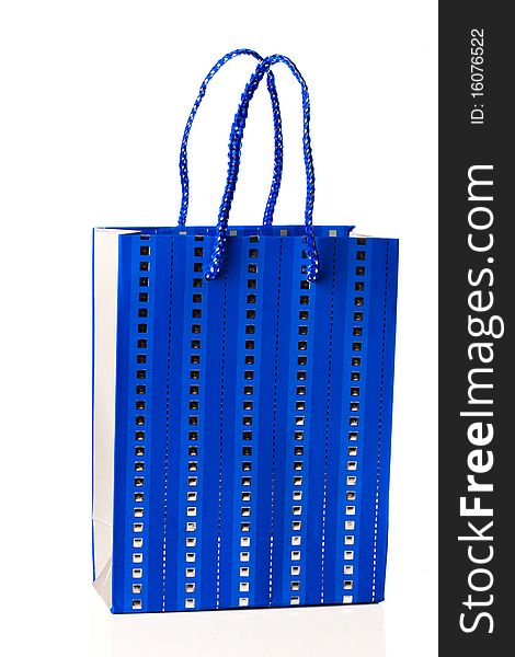 A blue shopping bag on a white background. A blue shopping bag on a white background