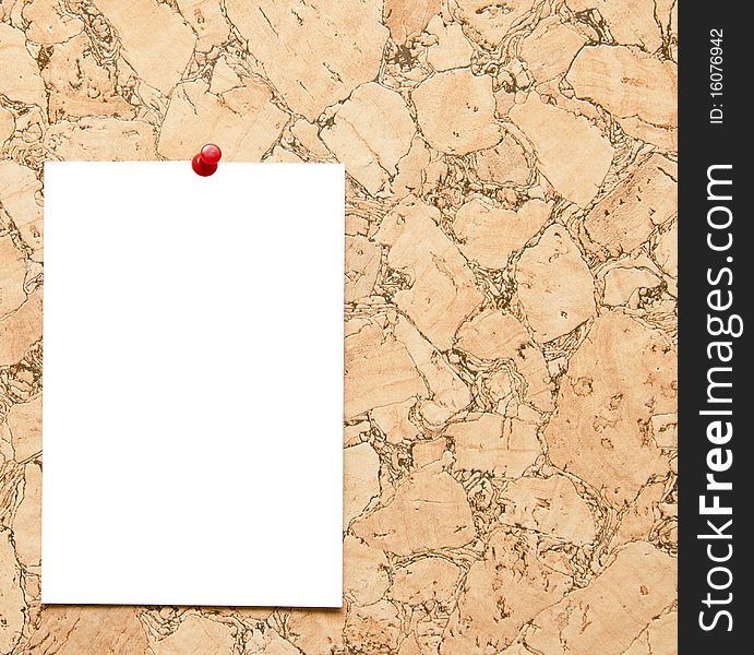 Cork board with blank note attached with thumb pin. Cork board with blank note attached with thumb pin