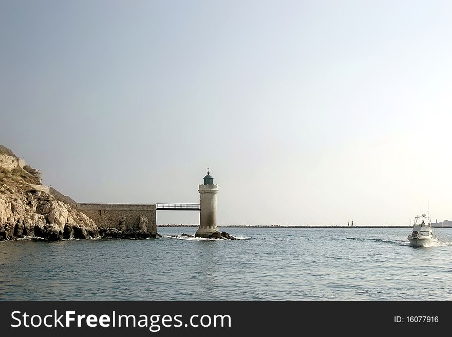 Small lighthouse in the port of Marseille