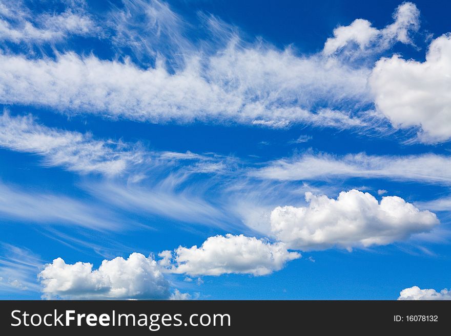 Cumulus clouds in blue sky