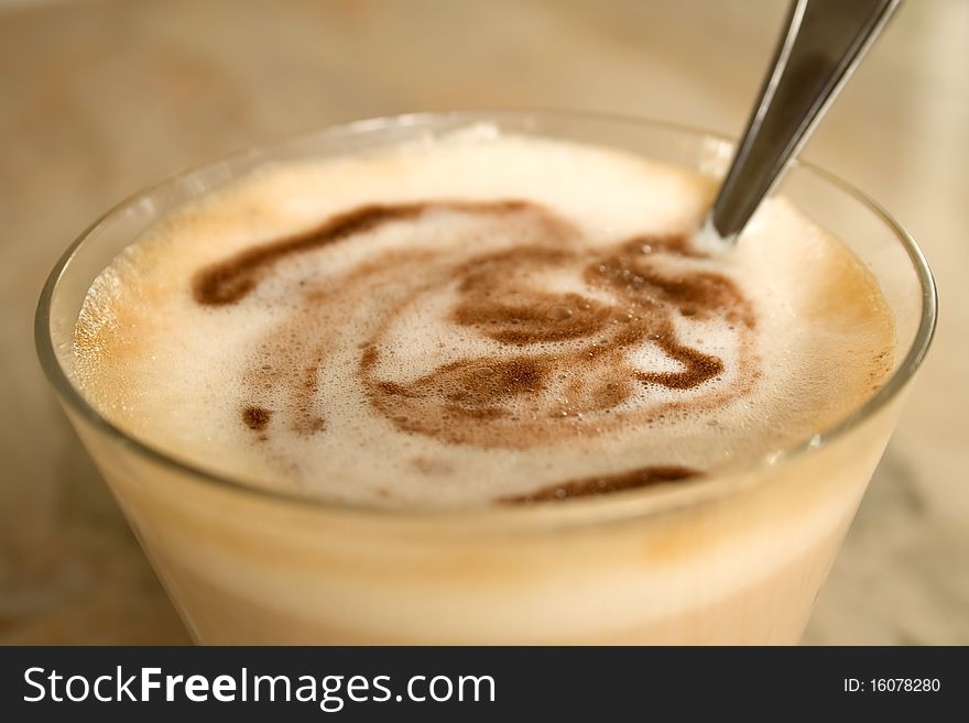 Glass of cappuccino with frothed milk. Glass of cappuccino with frothed milk