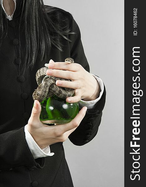 The Person Hold Poison With A Snake