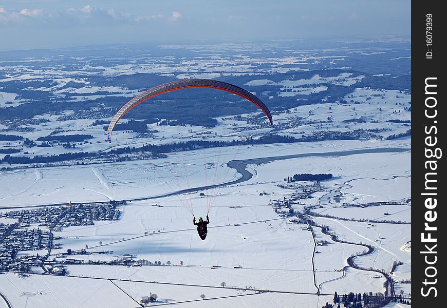 Paraglider Flying Over A Valley In Germany