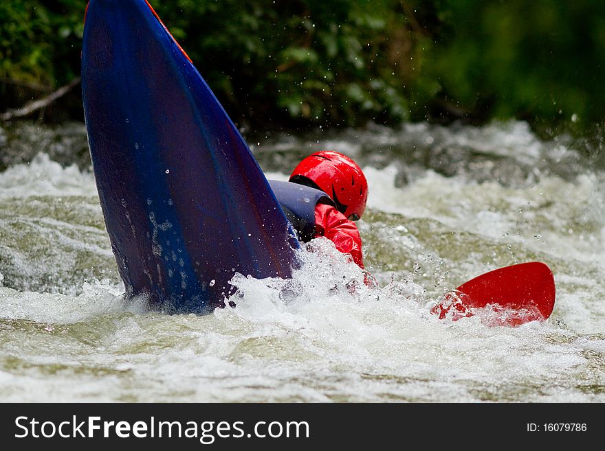 Kajaking in the river in rough conditions