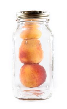 Canning Peaches In A Glass Jar Royalty Free Stock Image Canning Peaches In A Glass Jar Royalty Free Stock Image