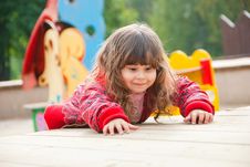 Little Girl Plays In Playground Stock Photos