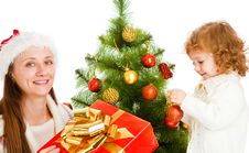 Opening Christmas Present Royalty Free Stock Images