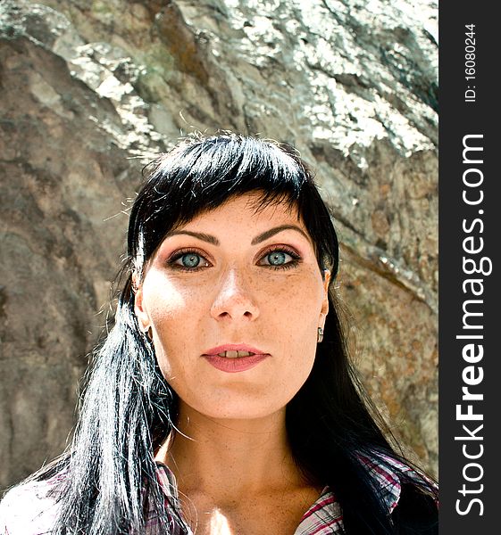Blue eyed girl portrait in the mountains. Blue eyed girl portrait in the mountains