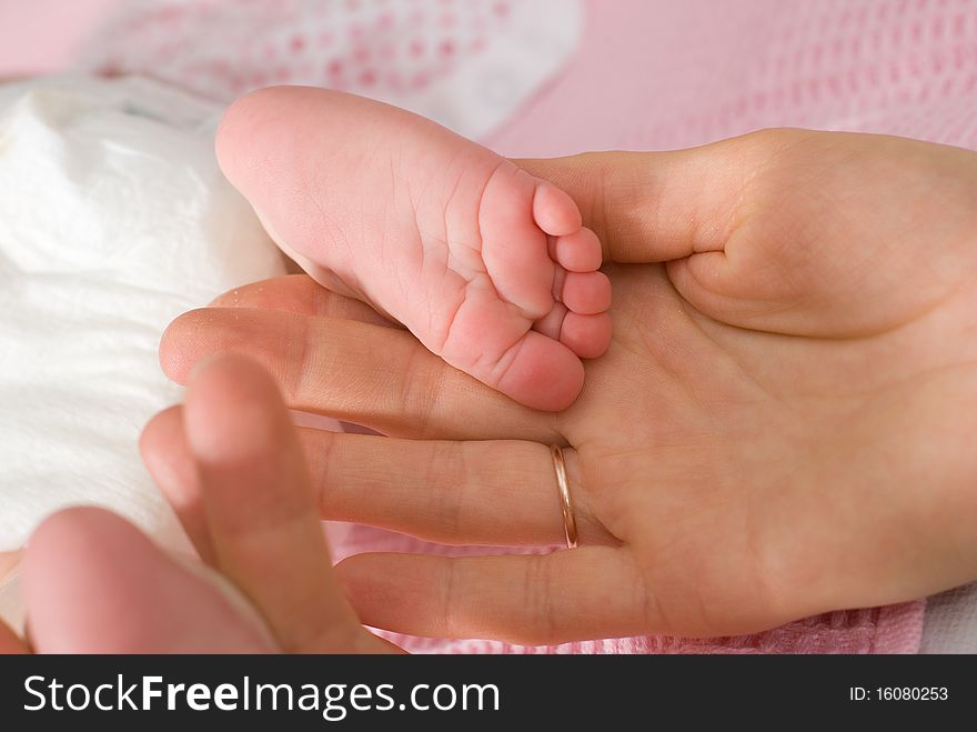 Feet of newborn baby