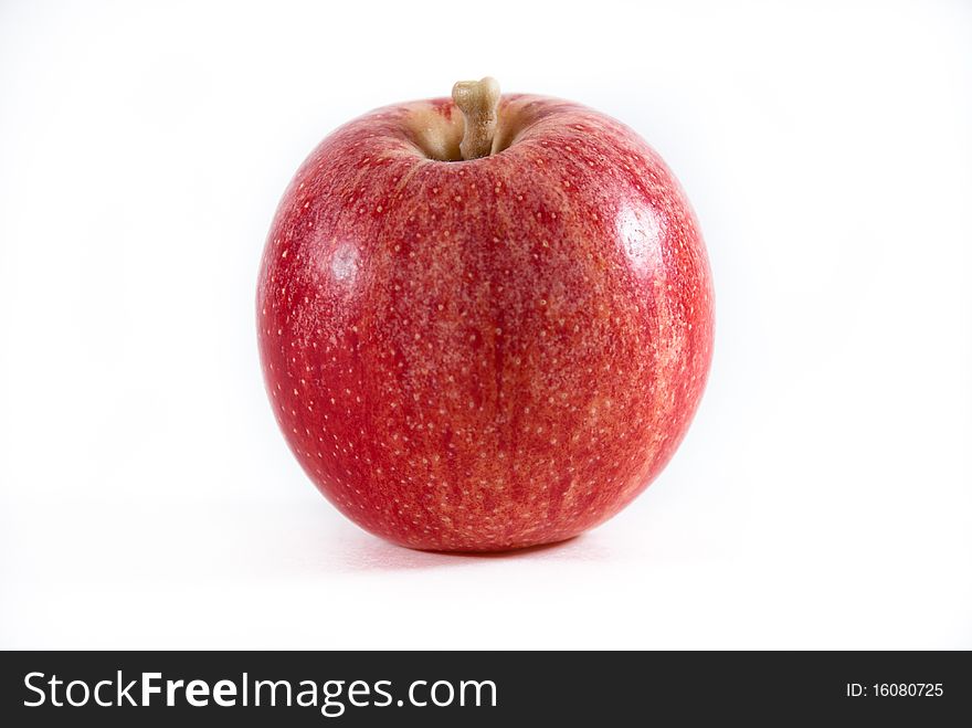 A fresh red and yellow gala apple on a white isolated bacground. A fresh red and yellow gala apple on a white isolated bacground.