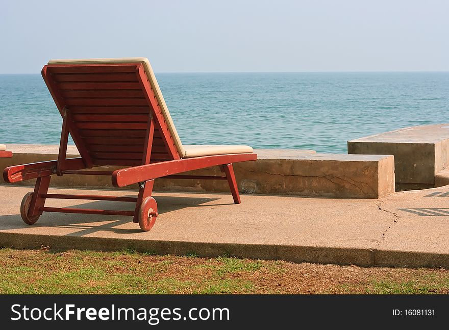 Lonely Chair on Hua-Hin beach Thailand. Hua-Hin is one of the most favorite city in Thailand